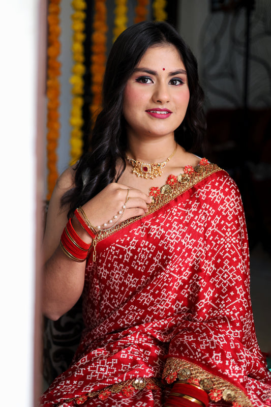 Red pure Gazzi silk saree with chunri print