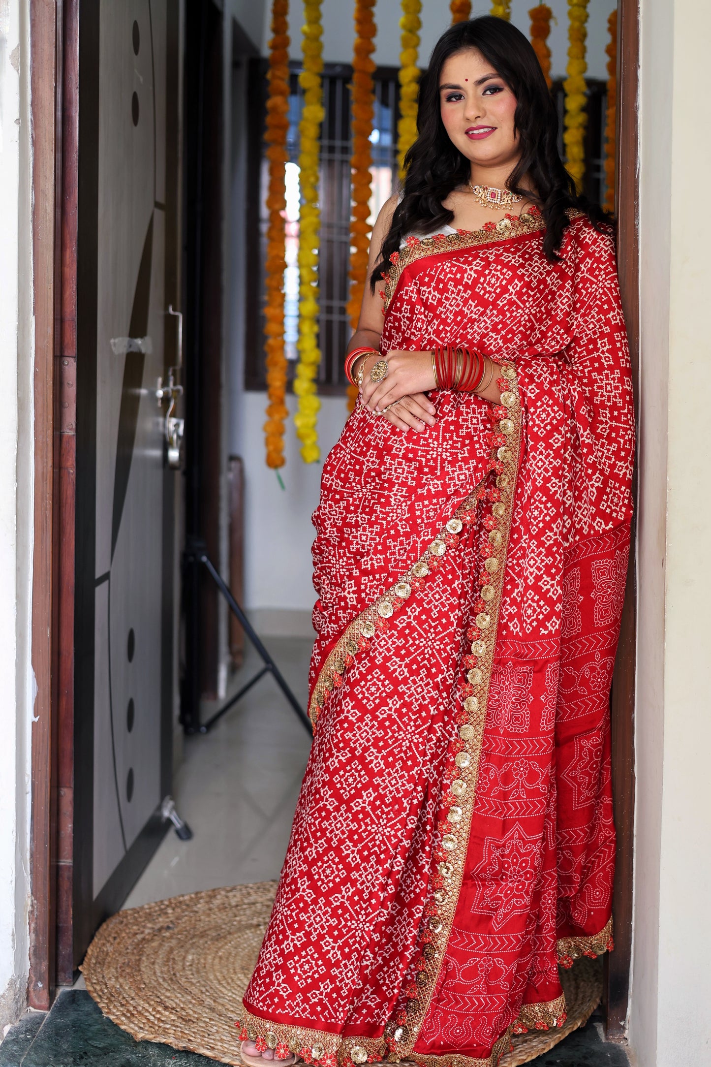 Red pure Gazzi silk saree with chunri print