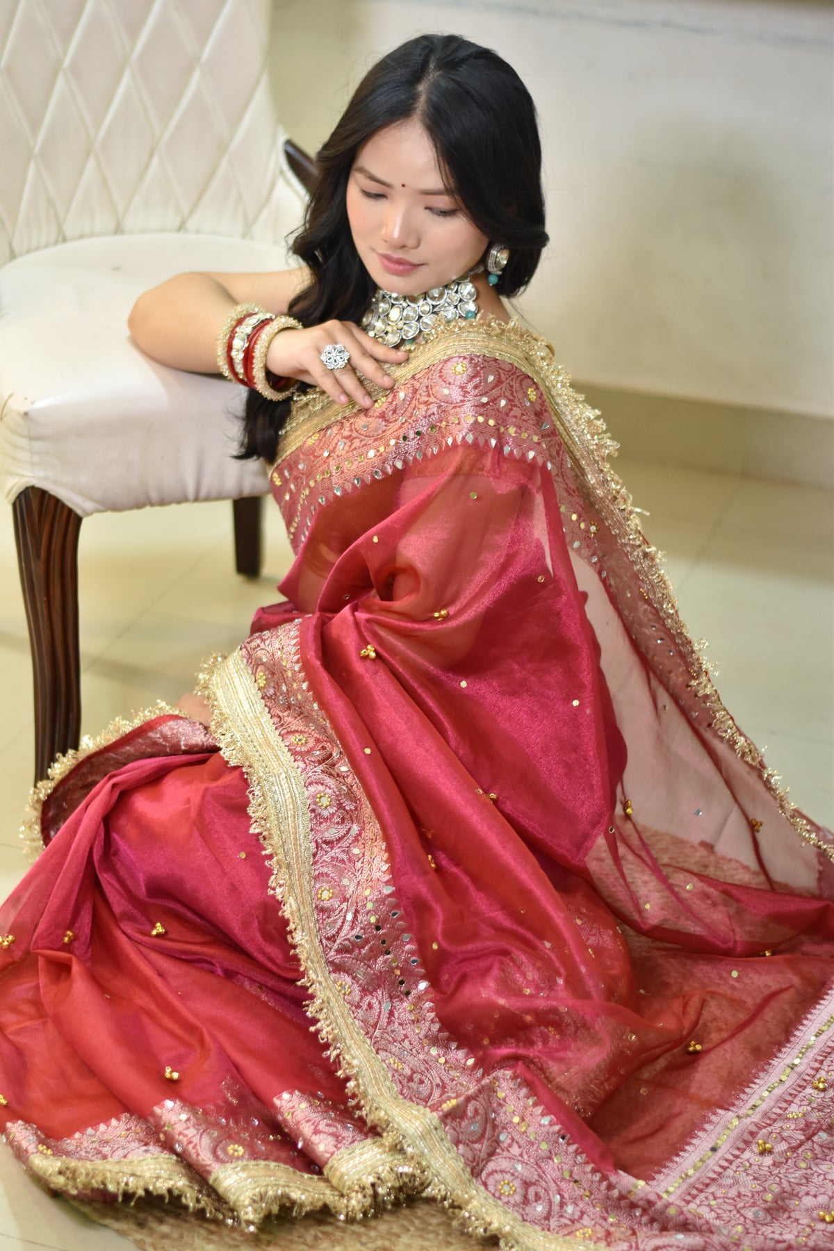 Banarasi Handwoven Tissue Saree With beautiful hand mirror work and pearl and Embroidered Ghungroo Work - Rust red