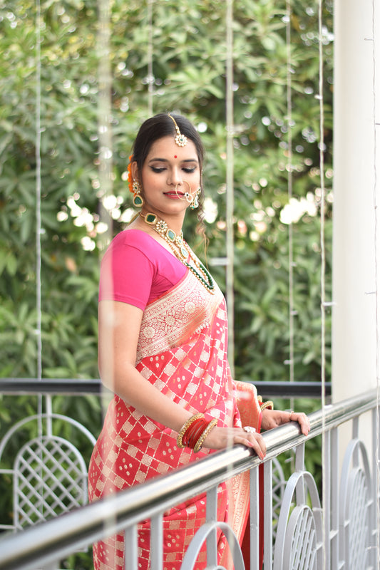 Beautiful handwoven pink banarasi saree with golden zari work all over the saree