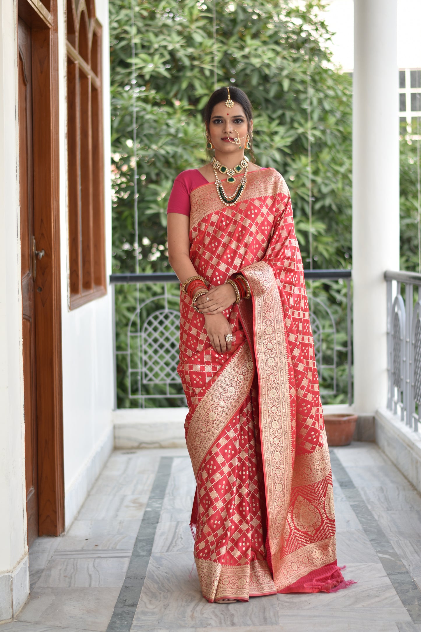 Beautiful handwoven pink banarasi saree with golden zari work all over the saree