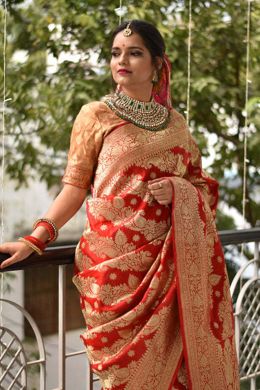 Beautiful handwoven red banarasi silk saree with golden zari work all over the saree
