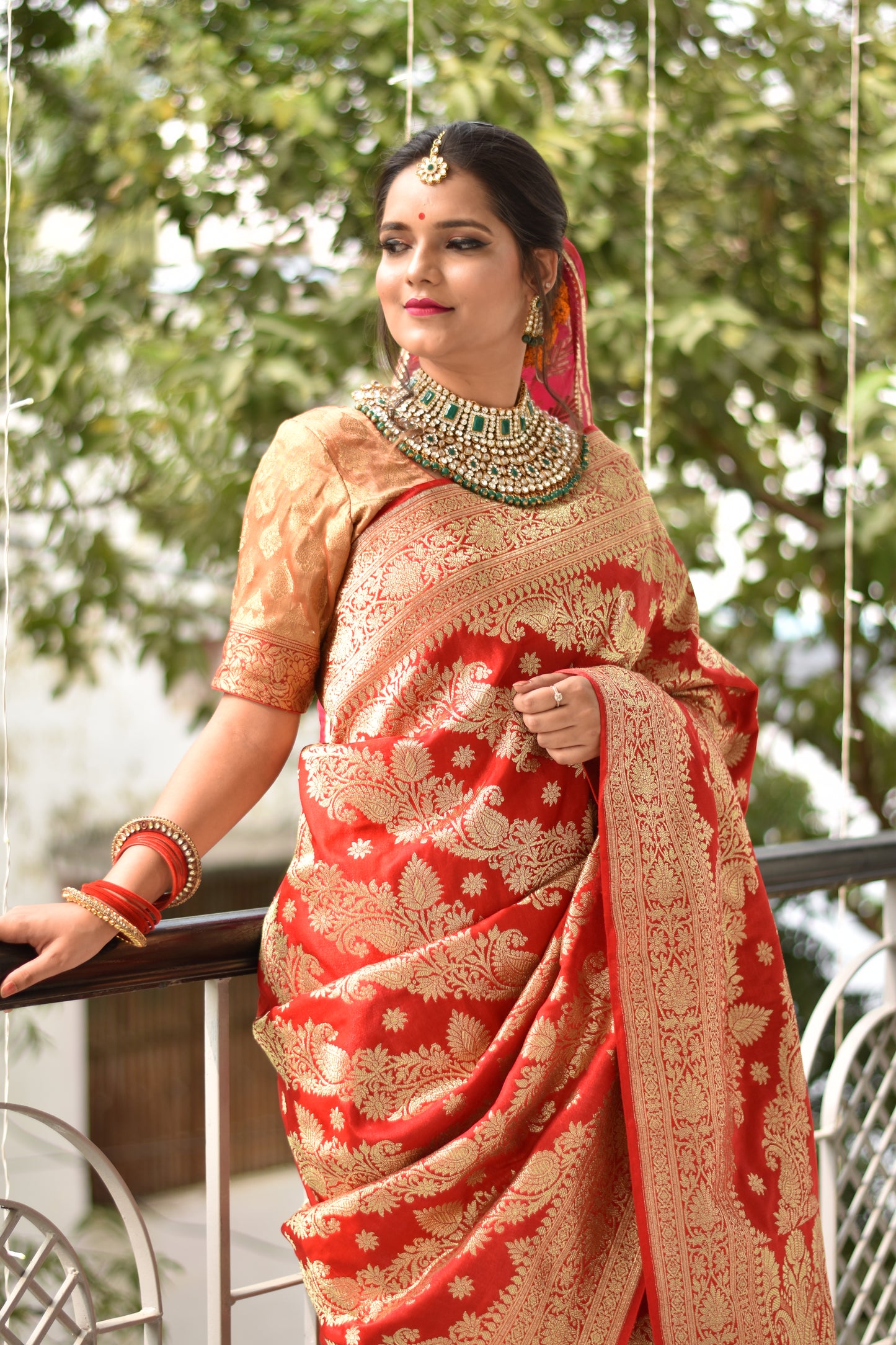 Beautiful handwoven red banarasi silk saree with golden zari work all over the saree