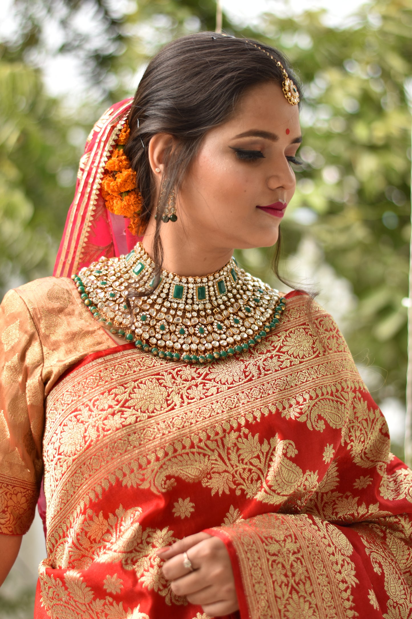 Beautiful handwoven red banarasi silk saree with golden zari work all over the saree