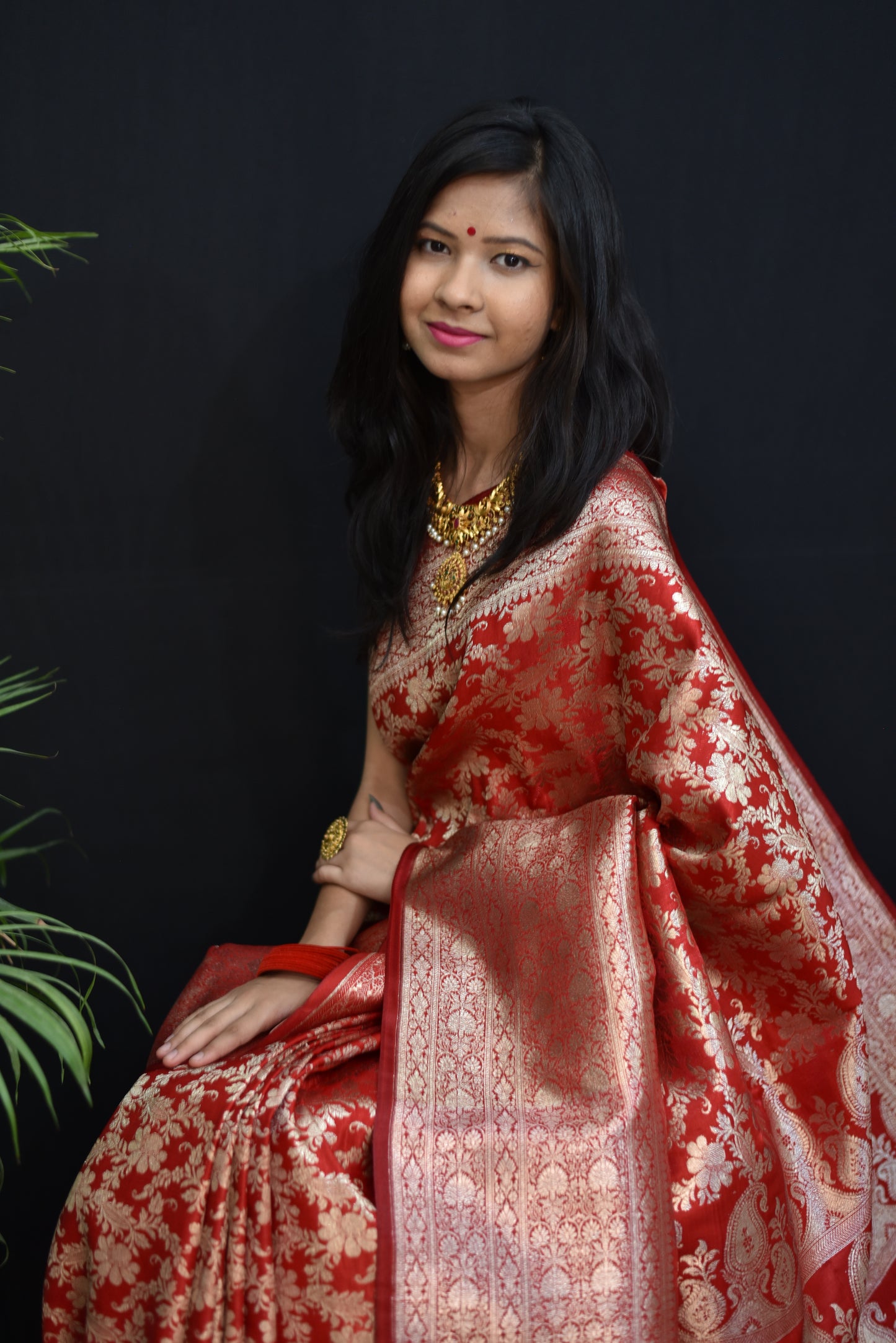 Red banarasi silk saree with golden zari weaving