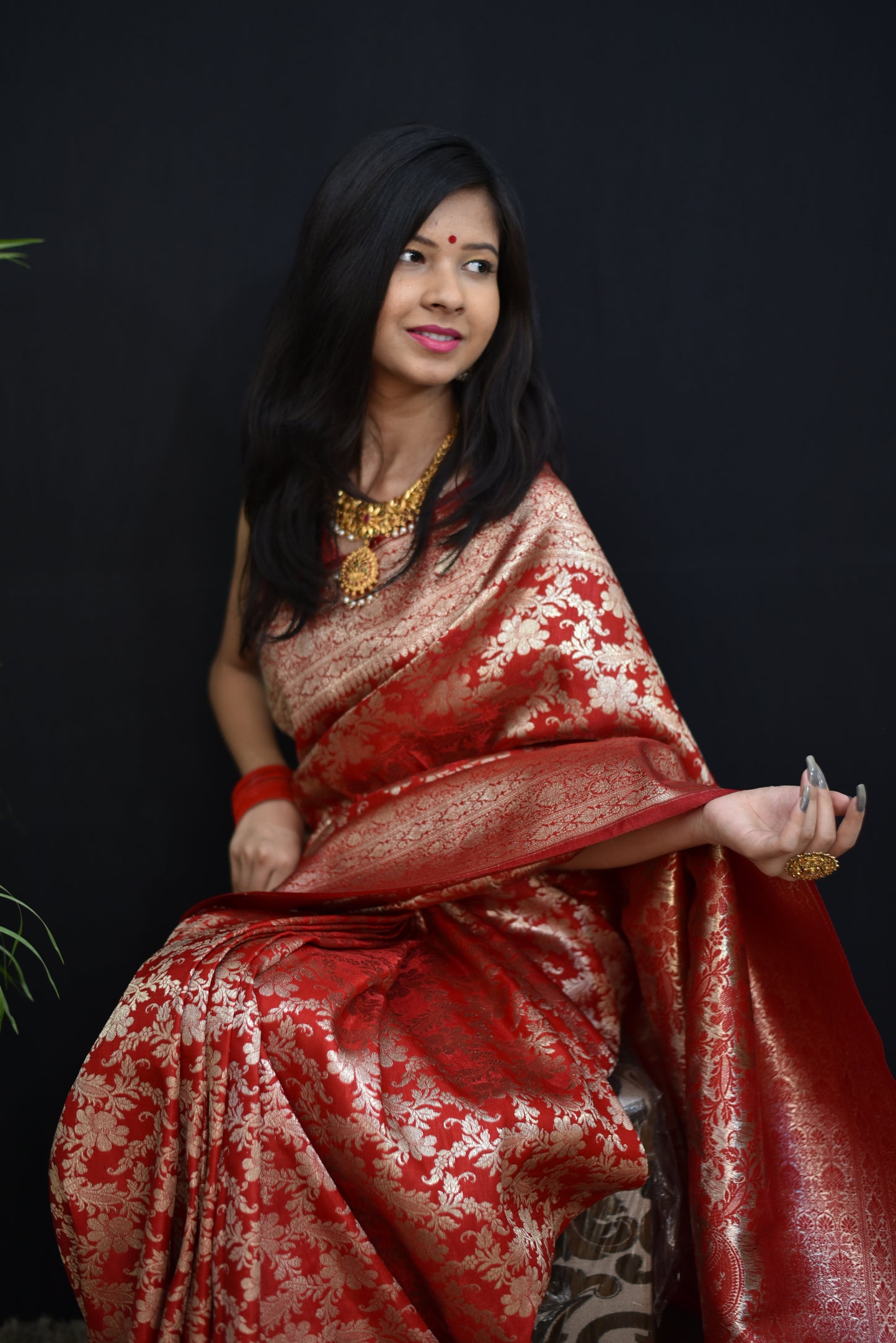 Red banarasi silk saree with golden zari weaving