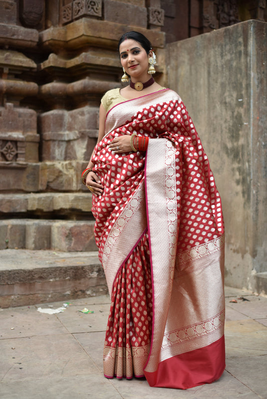Beautiful handwoven red banarasi saree with golden zari work all over the saree