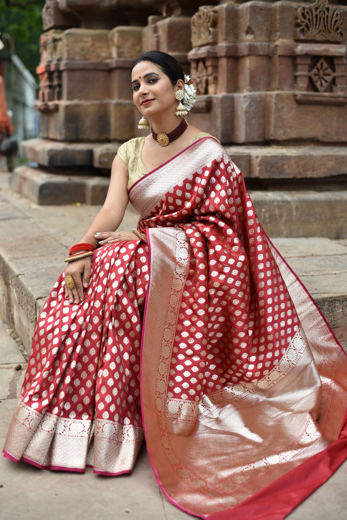 Beautiful handwoven red banarasi saree with golden zari work all over the saree
