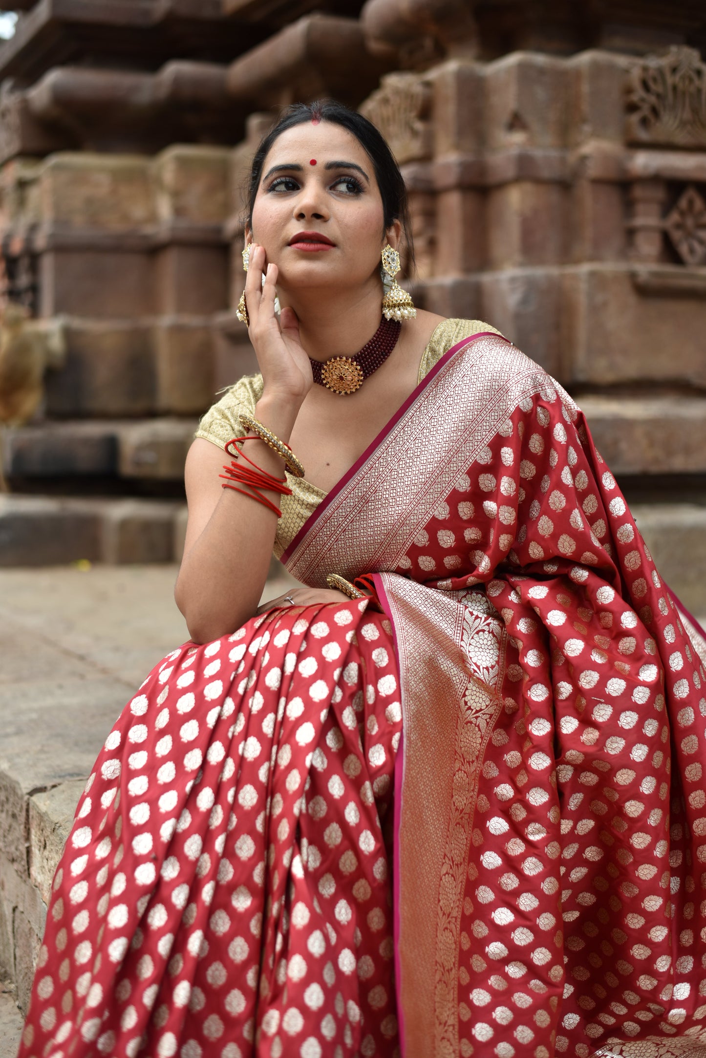 Beautiful handwoven red banarasi saree with golden zari work all over the saree
