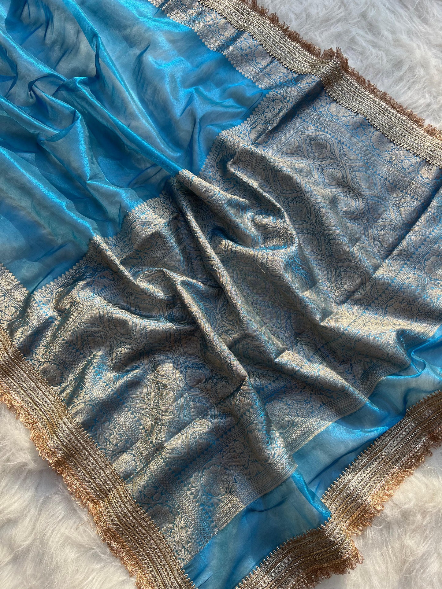 Banarasi handwoven peacock blue plane tissue silk saree with gota patti work