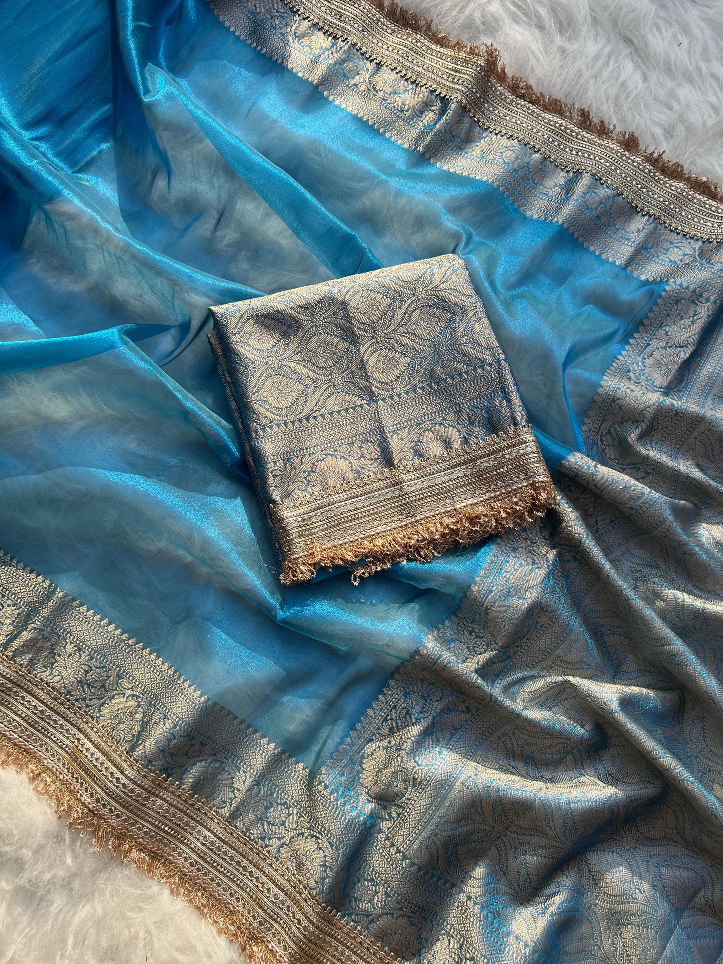 Banarasi handwoven peacock blue plane tissue silk saree with gota patti work