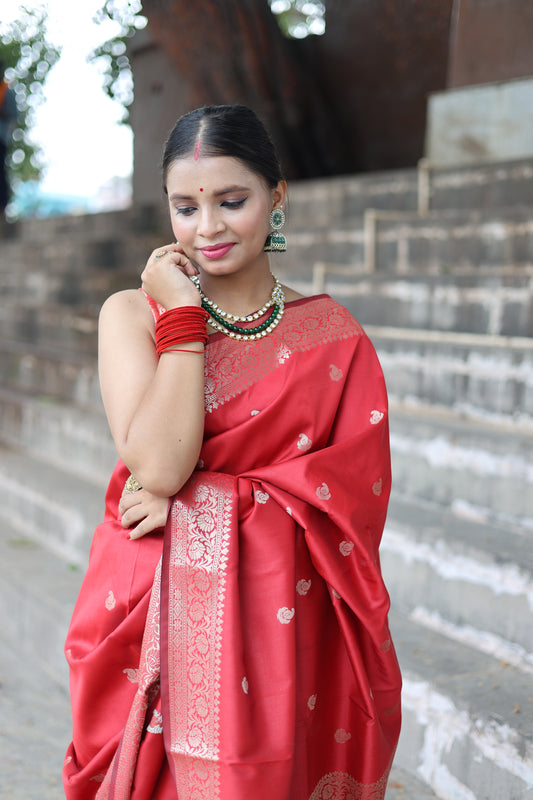 Beautiful red colour handwoven banarasi silk saree with small golden zari buti weaving.