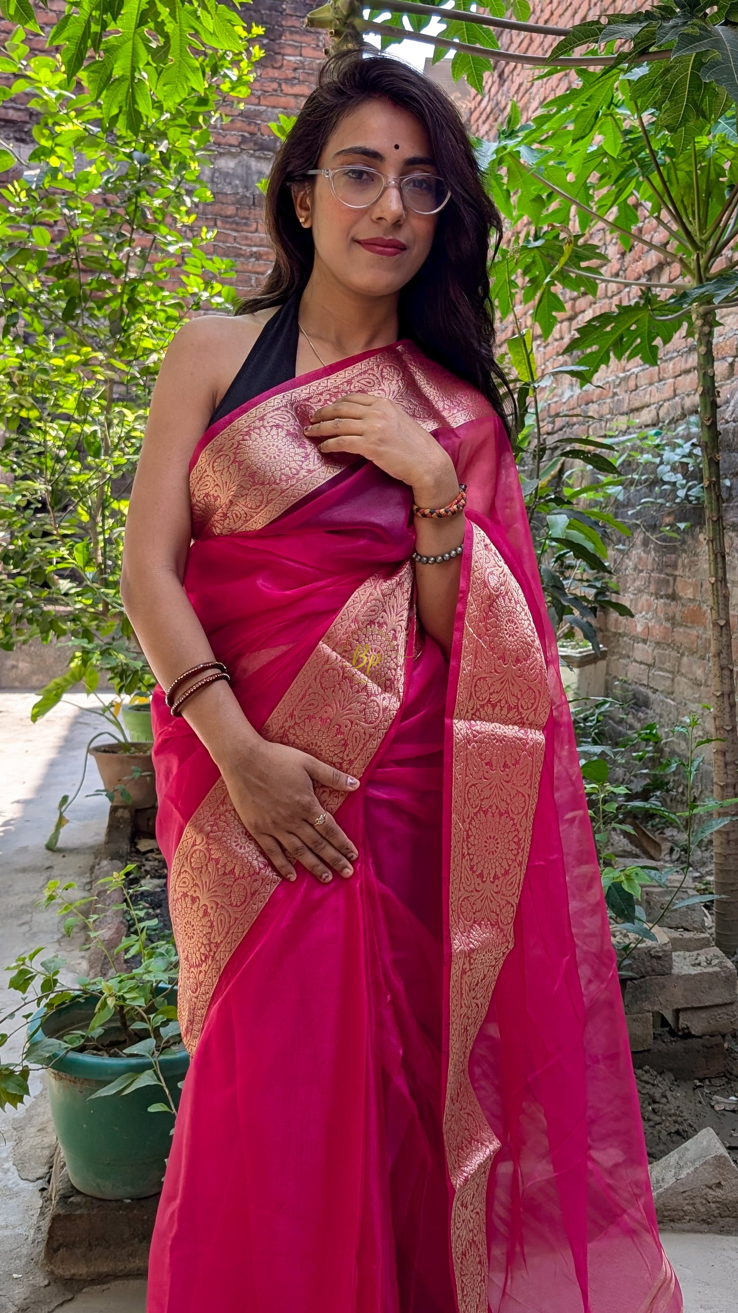 Rani colour handwoven banarasi organa saree with golden zari weaving