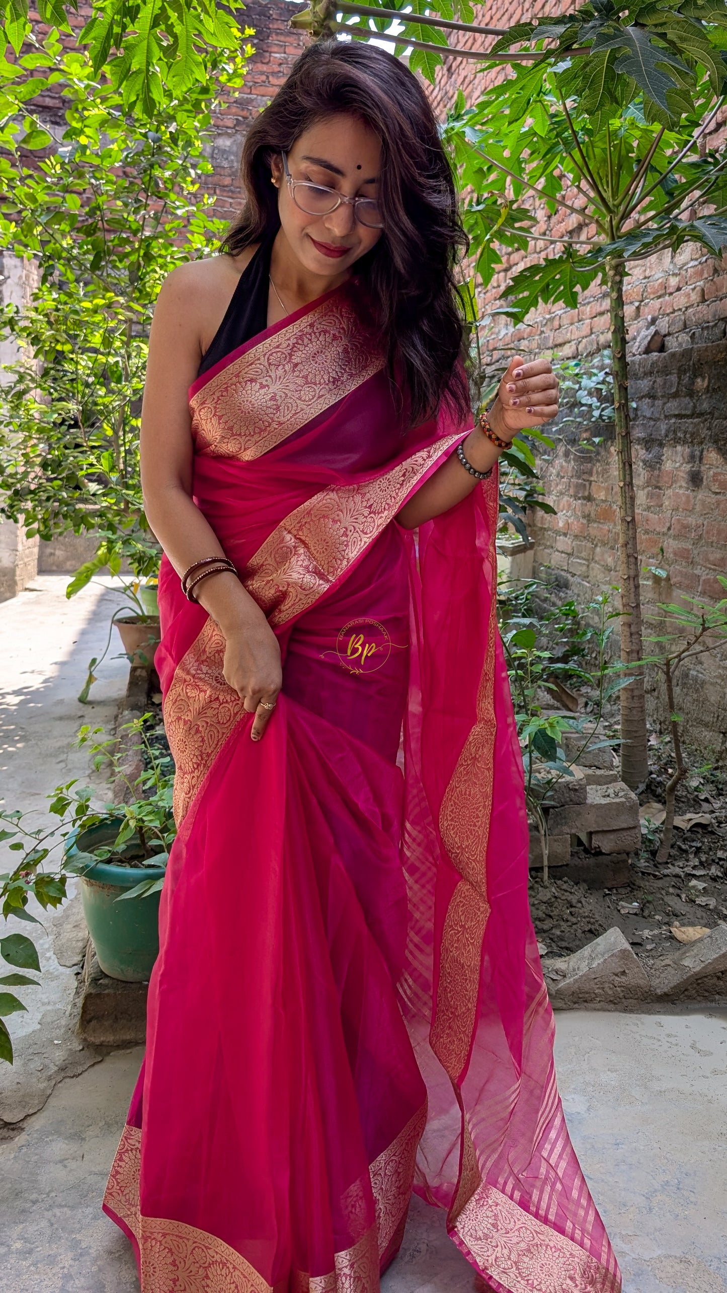 Rani colour handwoven banarasi organa saree with golden zari weaving
