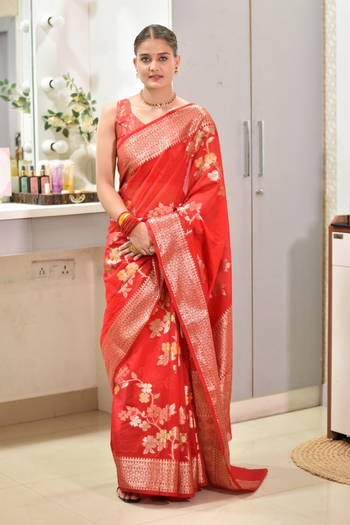 Banarasi semi chiffon saree with floral zari weaving and intricate details on border and pallu - red