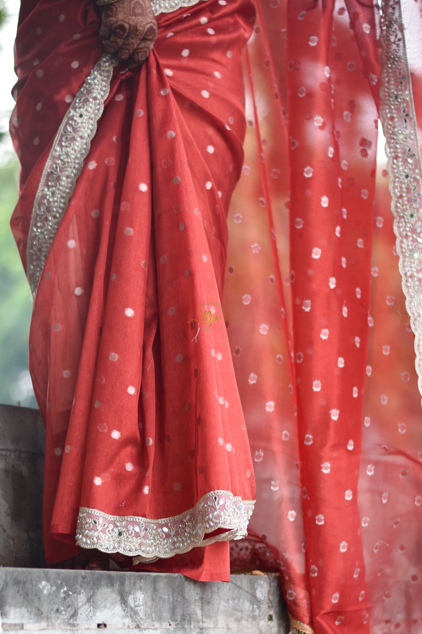 Red banarasi handwoven tissue silk saree with small zari weaving all over saree comes with beautiful pearl lace border