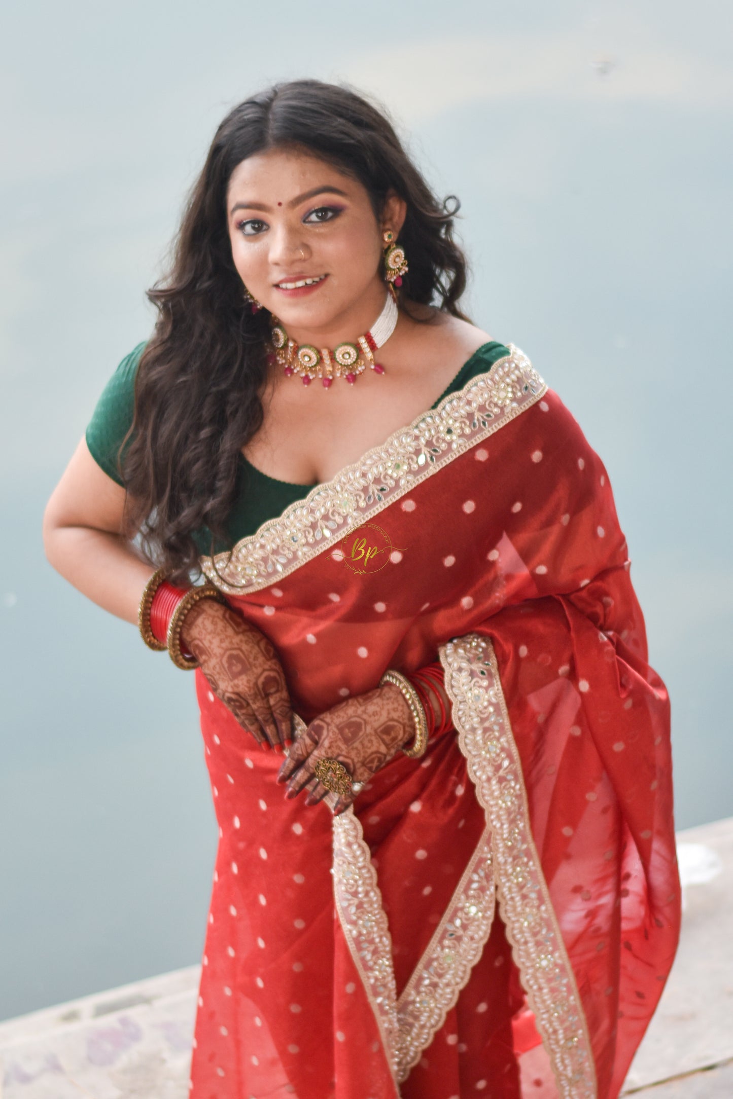 Red banarasi handwoven tissue silk saree with small zari weaving all over saree comes with beautiful pearl lace border