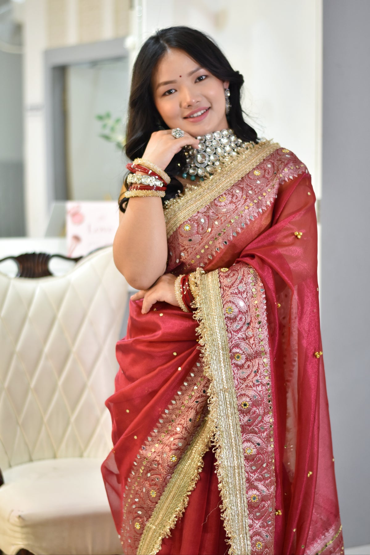 Banarasi Handwoven Tissue Saree With beautiful hand mirror work and pearl and  Embroidered Ghungroo Work - Rust red