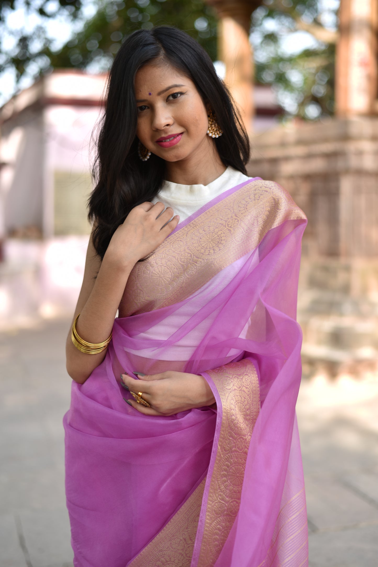 Beautiful banarasi organza saree in lavender shade comes with golden border and pallu