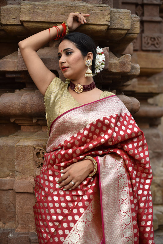 Beautiful handwoven red banarasi saree with golden zari work all over the saree