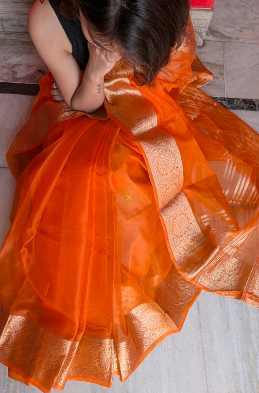 Orange handwoven banarasi organa saree with golden zari weaving